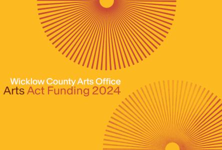 Yellow sign with words Wicklow County Arts Office Arts Act Funding 2023